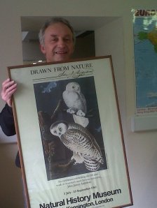 Steve Carroll holding a print from Audubon's Birds of America